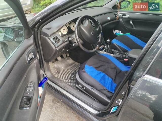 Черный Пежо 607, объемом двигателя 2.2 л и пробегом 460 тыс. км за 2124 $, фото 8 на Automoto.ua