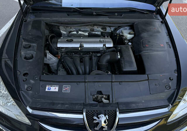 Черный Пежо 607, объемом двигателя 2.2 л и пробегом 212 тыс. км за 5900 $, фото 39 на Automoto.ua