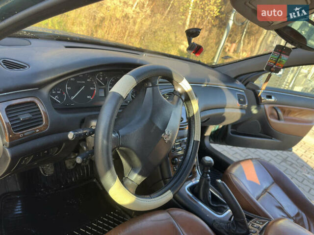 Зеленый Пежо 607, объемом двигателя 2.18 л и пробегом 290 тыс. км за 3300 $, фото 17 на Automoto.ua