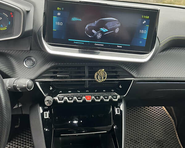 Білий Пежо e-2008, об'ємом двигуна 0 л та пробігом 67 тис. км за 15500 $, фото 12 на Automoto.ua