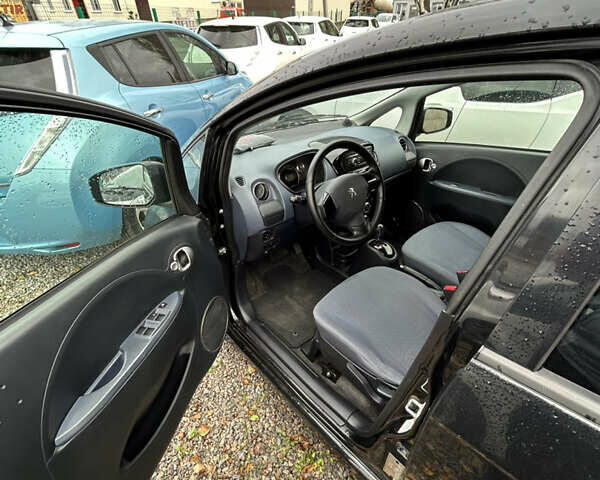 Черный Пежо иOн, объемом двигателя 0 л и пробегом 111 тыс. км за 4000 $, фото 2 на Automoto.ua