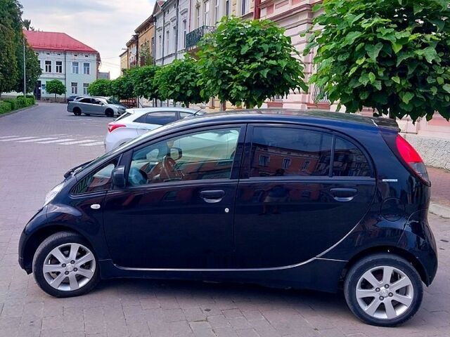 Черный Пежо иOн, объемом двигателя 47 л и пробегом 137 тыс. км за 4700 $, фото 1 на Automoto.ua