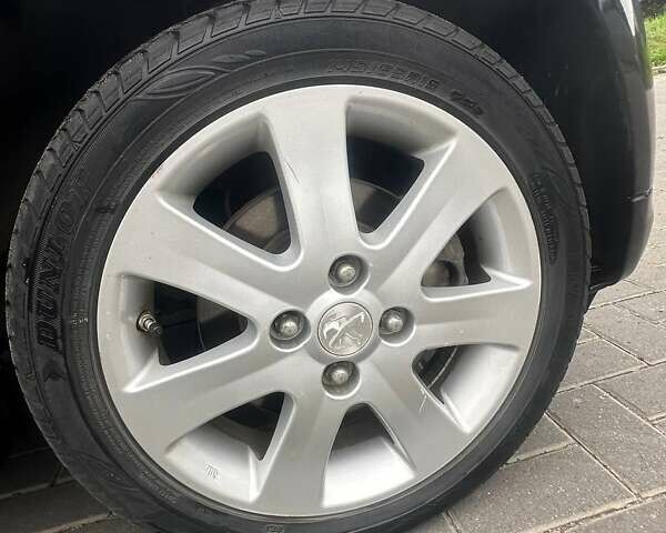 Черный Пежо иOн, объемом двигателя 0 л и пробегом 69 тыс. км за 5600 $, фото 16 на Automoto.ua