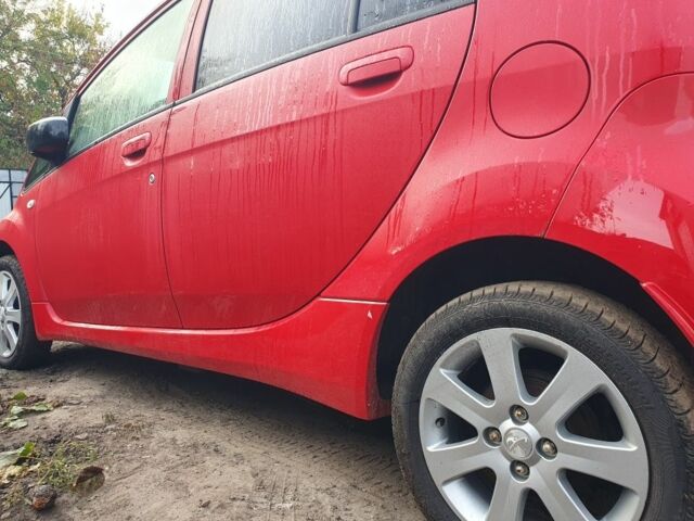 Красный Пежо иOн, объемом двигателя 0 л и пробегом 95 тыс. км за 5500 $, фото 3 на Automoto.ua