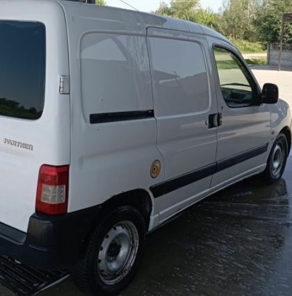 Белый Пежо Partner, объемом двигателя 1 л и пробегом 300 тыс. км за 1900 $, фото 1 на Automoto.ua