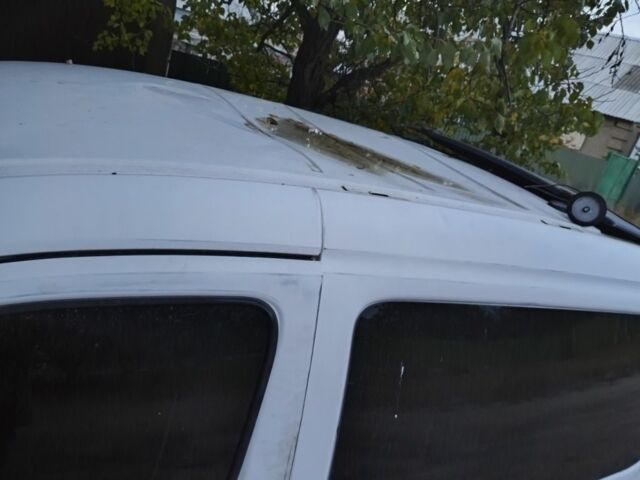 Белый Пежо Partner, объемом двигателя 1.6 л и пробегом 500 тыс. км за 700 $, фото 1 на Automoto.ua