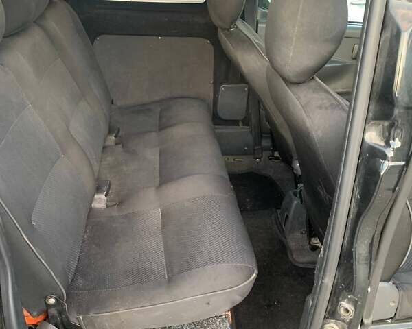 Чорний Пежо Partner, об'ємом двигуна 2 л та пробігом 397 тис. км за 3600 $, фото 2 на Automoto.ua