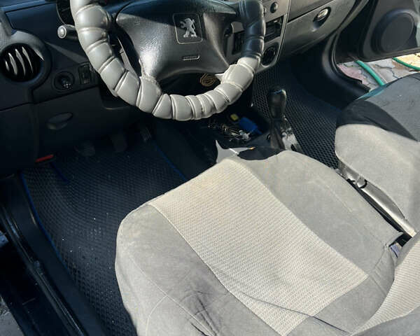 Черный Пежо Partner, объемом двигателя 1.9 л и пробегом 370 тыс. км за 4000 $, фото 9 на Automoto.ua