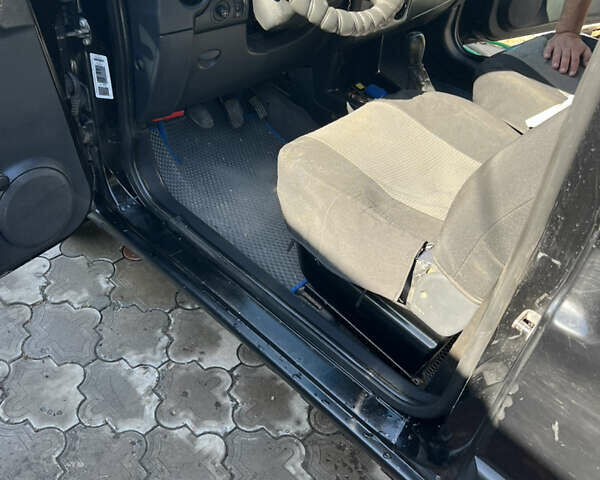 Черный Пежо Partner, объемом двигателя 1.9 л и пробегом 370 тыс. км за 4000 $, фото 10 на Automoto.ua