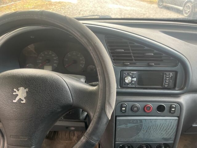 Серый Пежо Partner, объемом двигателя 2 л и пробегом 220 тыс. км за 1657 $, фото 1 на Automoto.ua