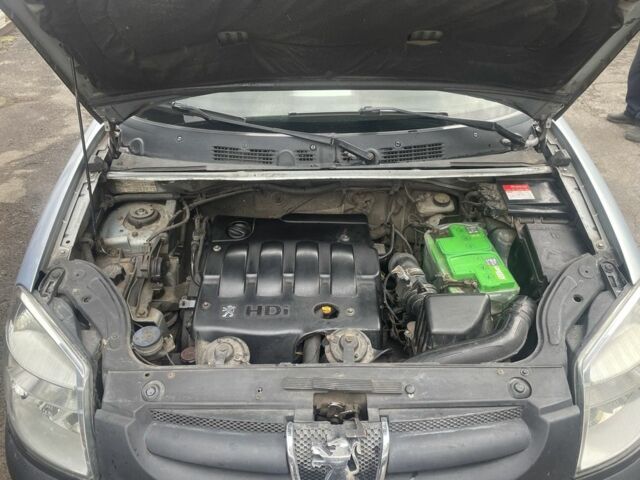 Серый Пежо Partner, объемом двигателя 2 л и пробегом 280 тыс. км за 3700 $, фото 1 на Automoto.ua