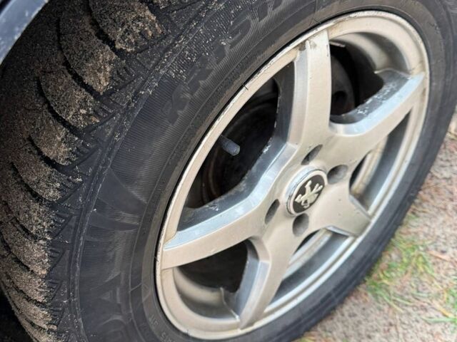 Серый Пежо Partner, объемом двигателя 2 л и пробегом 225 тыс. км за 3450 $, фото 12 на Automoto.ua