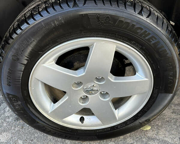 Серый Пежо Partner, объемом двигателя 1.56 л и пробегом 229 тыс. км за 4800 $, фото 13 на Automoto.ua