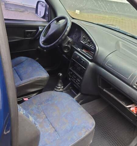 Синий Пежо Partner, объемом двигателя 1.36 л и пробегом 168 тыс. км за 2800 $, фото 7 на Automoto.ua