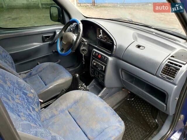 Синий Пежо Partner, объемом двигателя 1.91 л и пробегом 222 тыс. км за 1500 $, фото 15 на Automoto.ua