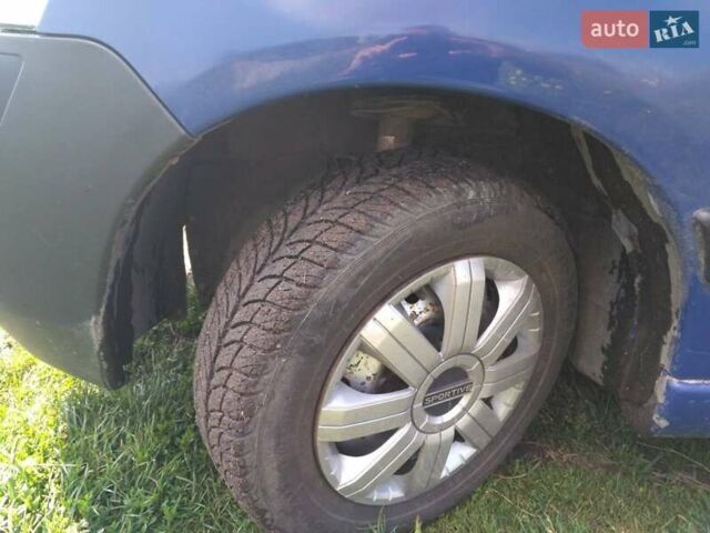 Синий Пежо Partner, объемом двигателя 2 л и пробегом 307 тыс. км за 3300 $, фото 5 на Automoto.ua