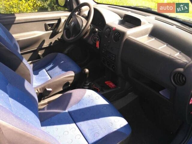 Синий Пежо Partner, объемом двигателя 2 л и пробегом 307 тыс. км за 3300 $, фото 1 на Automoto.ua