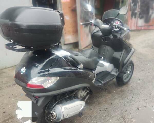 Черный Пиаджо MP3, объемом двигателя 0.25 л и пробегом 17 тыс. км за 2500 $, фото 10 на Automoto.ua