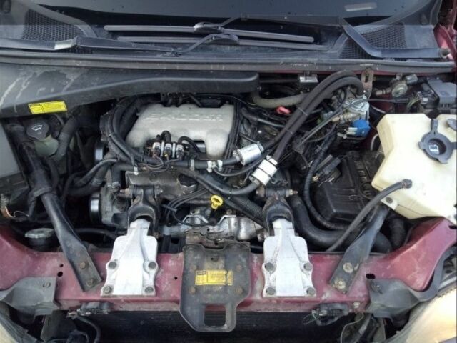 Червоний Понтіак Montana, об'ємом двигуна 0 л та пробігом 200 тис. км за 2500 $, фото 1 на Automoto.ua