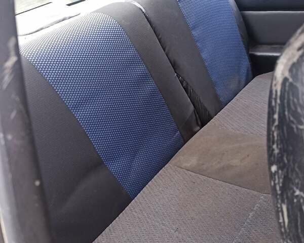 Черный Понтиак Санберд, объемом двигателя 2 л и пробегом 120 тыс. км за 450 $, фото 3 на Automoto.ua