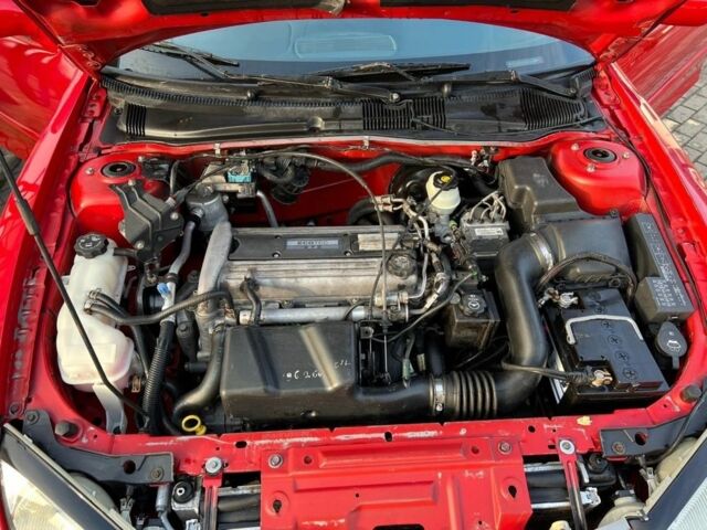 Красный Понтиак Санфаер, объемом двигателя 2.2 л и пробегом 200 тыс. км за 2800 $, фото 3 на Automoto.ua