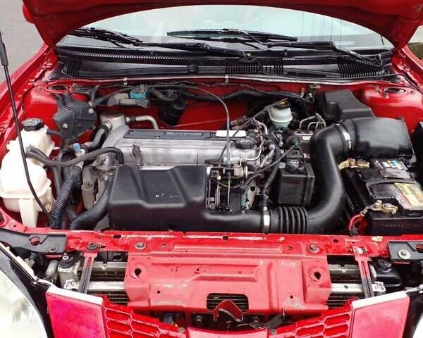 Красный Понтиак Санфаер, объемом двигателя 2.19 л и пробегом 250 тыс. км за 3300 $, фото 6 на Automoto.ua