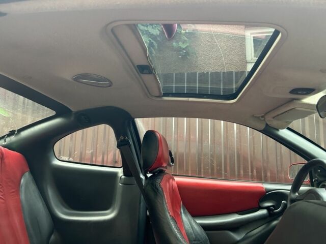 Красный Понтиак Санфаер, объемом двигателя 2.2 л и пробегом 200 тыс. км за 2800 $, фото 5 на Automoto.ua