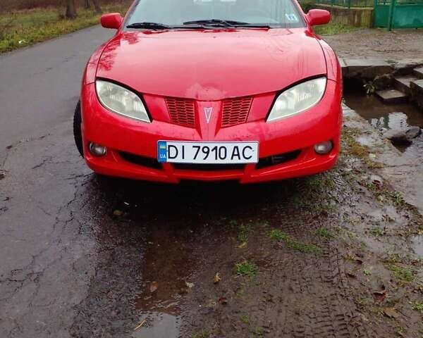 Красный Понтиак Санфаер, объемом двигателя 2.19 л и пробегом 250 тыс. км за 3300 $, фото 1 на Automoto.ua