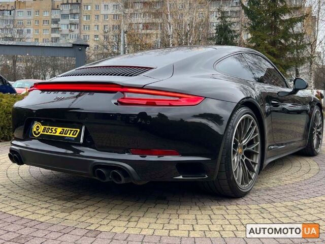 Черный Порше 911 Каррера, объемом двигателя 3 л и пробегом 55 тыс. км за 93900 $, фото 6 на Automoto.ua