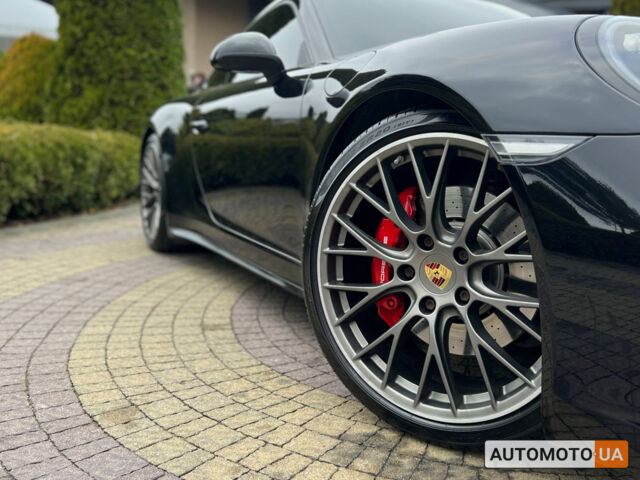 Черный Порше 911 Каррера, объемом двигателя 3 л и пробегом 55 тыс. км за 93900 $, фото 11 на Automoto.ua