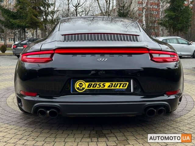 Черный Порше 911 Каррера, объемом двигателя 3 л и пробегом 55 тыс. км за 93900 $, фото 5 на Automoto.ua