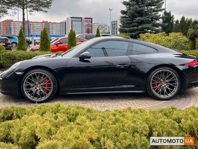 Черный Порше 911 Каррера, объемом двигателя 3 л и пробегом 55 тыс. км за 93900 $, фото 3 на Automoto.ua