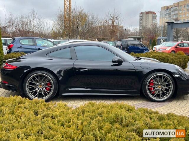 Черный Порше 911 Каррера, объемом двигателя 3 л и пробегом 55 тыс. км за 93900 $, фото 7 на Automoto.ua