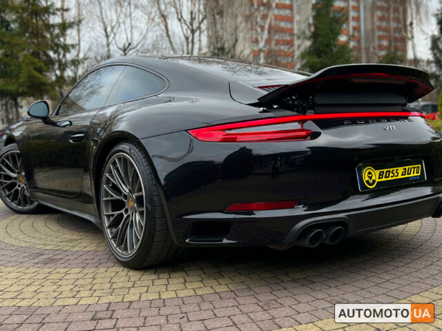 Черный Порше 911 Каррера, объемом двигателя 3 л и пробегом 55 тыс. км за 93900 $, фото 9 на Automoto.ua