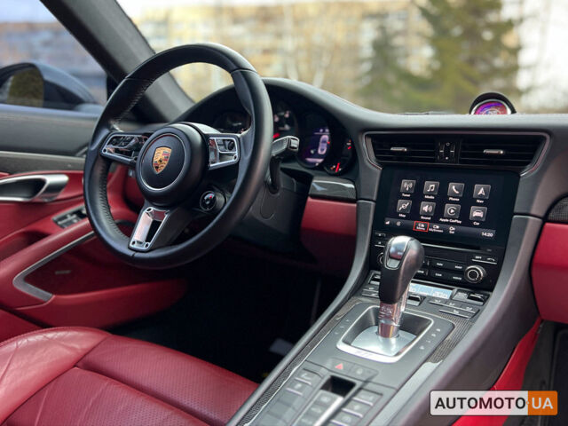 Черный Порше 911 Каррера, объемом двигателя 3 л и пробегом 55 тыс. км за 93900 $, фото 16 на Automoto.ua