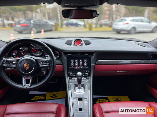 Черный Порше 911 Каррера, объемом двигателя 3 л и пробегом 55 тыс. км за 93900 $, фото 23 на Automoto.ua