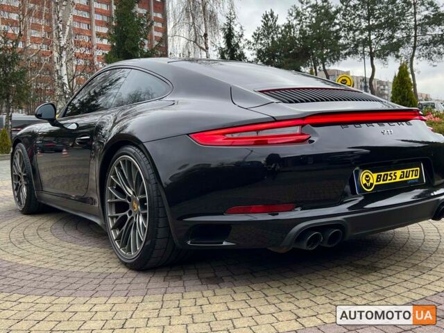 Черный Порше 911 Каррера, объемом двигателя 3 л и пробегом 55 тыс. км за 93900 $, фото 4 на Automoto.ua