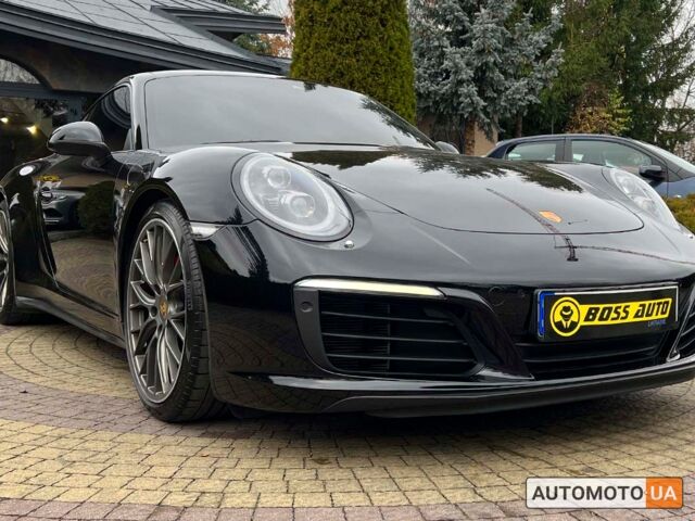 Черный Порше 911 Каррера, объемом двигателя 3 л и пробегом 55 тыс. км за 93900 $, фото 8 на Automoto.ua
