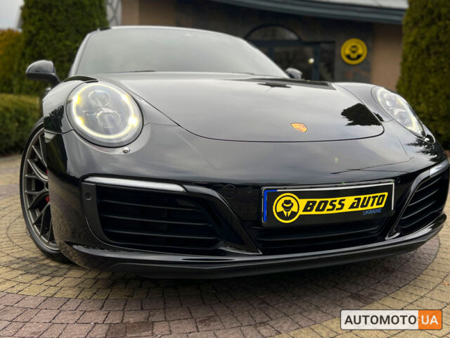 Черный Порше 911 Каррера, объемом двигателя 3 л и пробегом 55 тыс. км за 93900 $, фото 10 на Automoto.ua