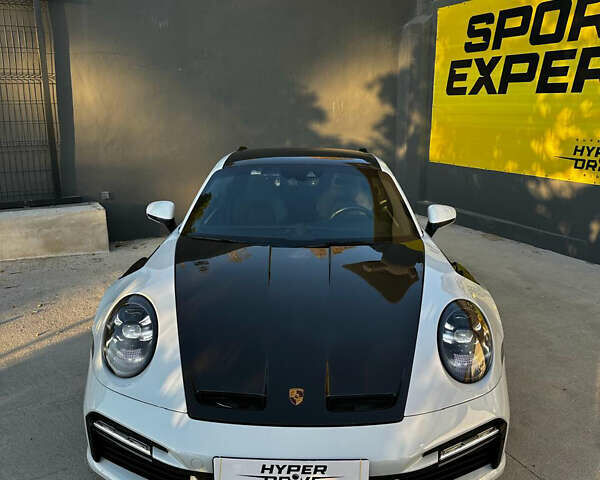Белый Порше 911, объемом двигателя 3.75 л и пробегом 50 тыс. км за 350000 $, фото 1 на Automoto.ua