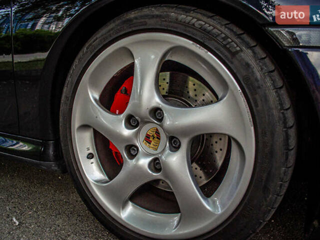 Черный Порше 911, объемом двигателя 3.6 л и пробегом 110 тыс. км за 41000 $, фото 17 на Automoto.ua