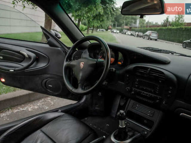 Черный Порше 911, объемом двигателя 3.6 л и пробегом 110 тыс. км за 41000 $, фото 52 на Automoto.ua