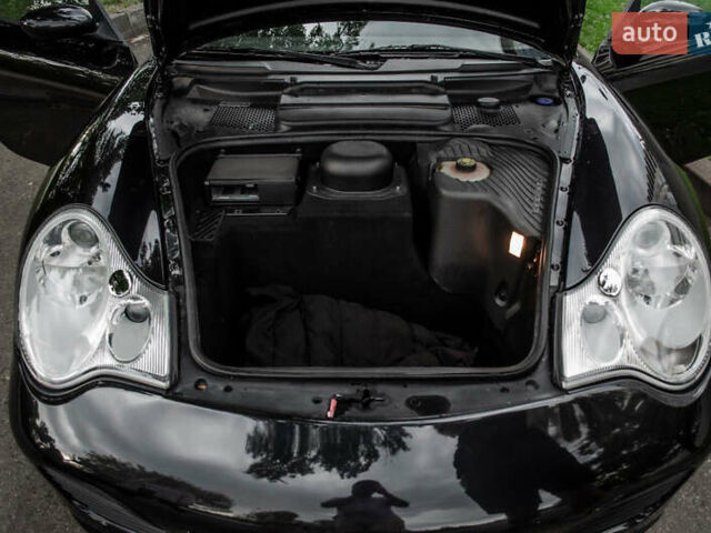 Черный Порше 911, объемом двигателя 3.6 л и пробегом 110 тыс. км за 41000 $, фото 33 на Automoto.ua