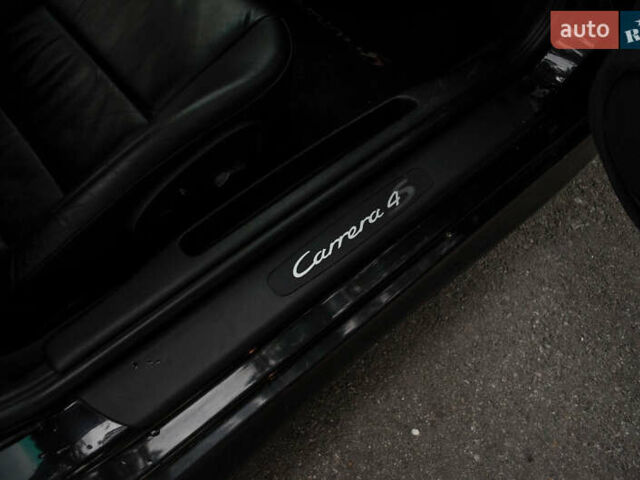 Черный Порше 911, объемом двигателя 3.6 л и пробегом 110 тыс. км за 41000 $, фото 53 на Automoto.ua