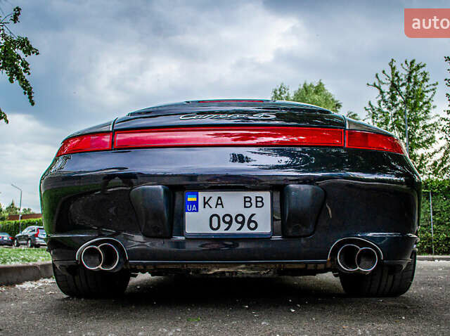 Черный Порше 911, объемом двигателя 3.6 л и пробегом 110 тыс. км за 41000 $, фото 29 на Automoto.ua