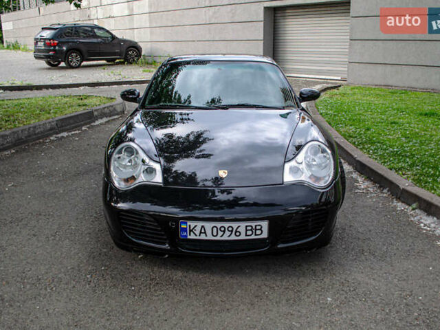 Черный Порше 911, объемом двигателя 3.6 л и пробегом 110 тыс. км за 41000 $, фото 7 на Automoto.ua