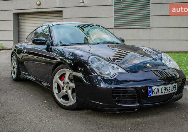 Черный Порше 911, объемом двигателя 3.6 л и пробегом 110 тыс. км за 41000 $, фото 23 на Automoto.ua