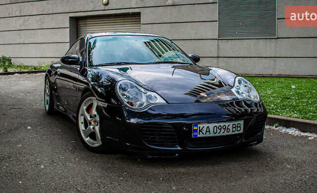 Черный Порше 911, объемом двигателя 3.6 л и пробегом 110 тыс. км за 41000 $, фото 24 на Automoto.ua