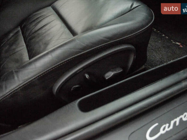 Черный Порше 911, объемом двигателя 3.6 л и пробегом 110 тыс. км за 41000 $, фото 54 на Automoto.ua