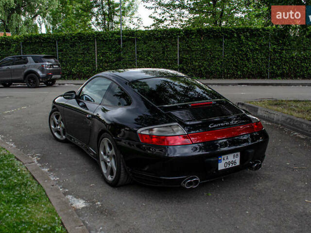 Черный Порше 911, объемом двигателя 3.6 л и пробегом 110 тыс. км за 41000 $, фото 11 на Automoto.ua